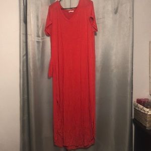 Coral maxi dress with the bottom sides split.